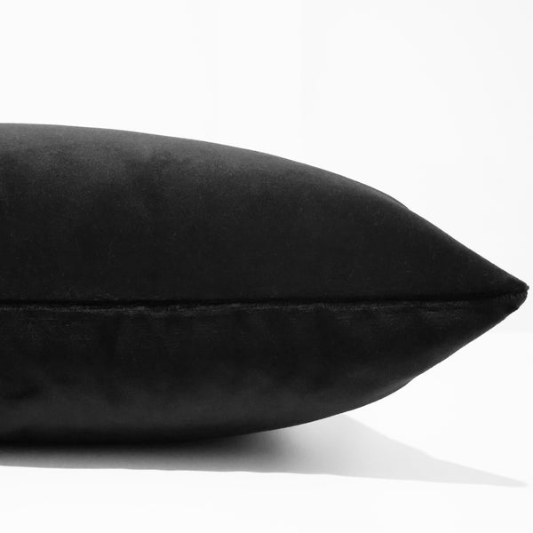 Noir velveteen pillow cover with soft matte finish, front corner detail