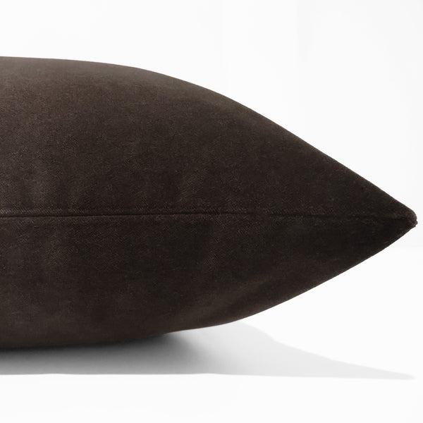Espresso velveteen pillow cover with soft matte finish, front corner detail