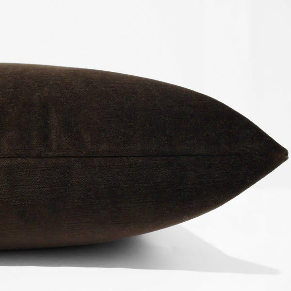 Umber velveteen pillow cover with heathered woven texture, front corner detail