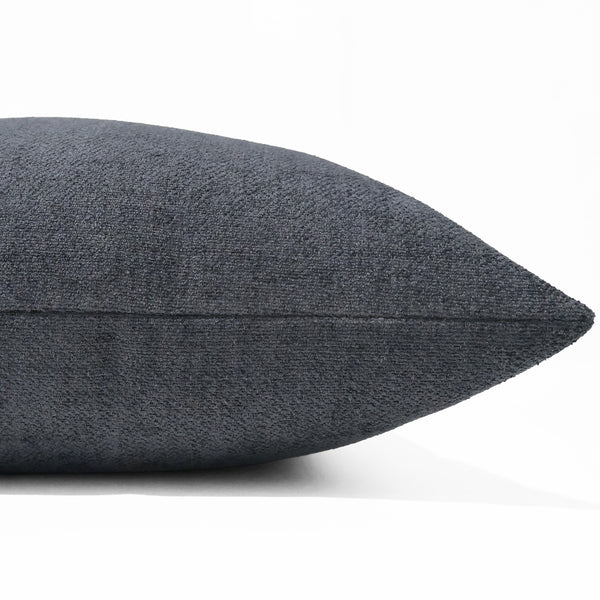 Graphite blue pillow cover with lightly textured velveteen finish, front corner detail