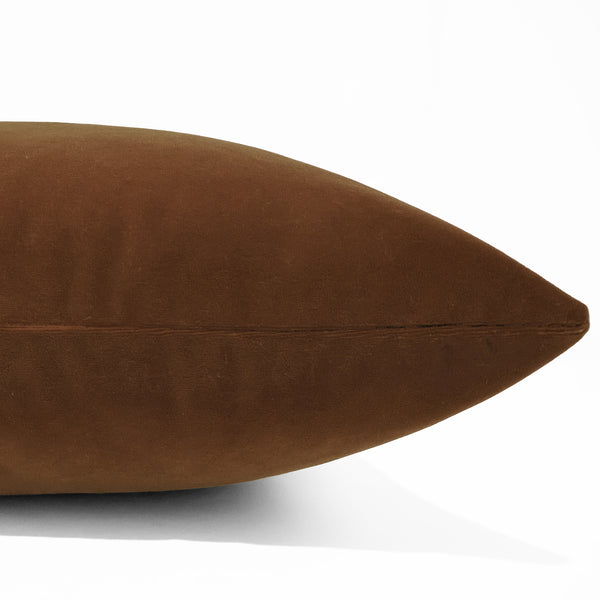 Nutmeg velveteen pillow cover with smooth matte finish, front corner detail