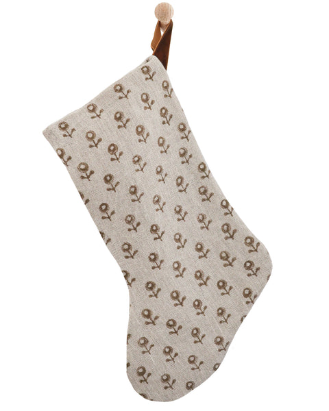 Acorn Blossom Christmas stocking, boho design, in natural block print linen hanging from a wooden peg by a velvet loop