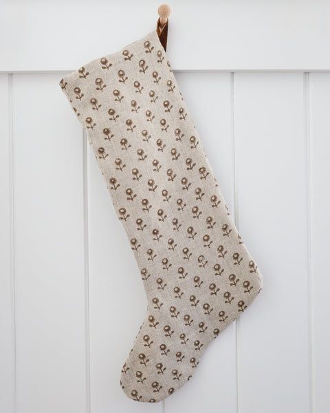 Acorn Blossom large stocking hanging against white paneled wall with velvet hanging loop and wooden peg