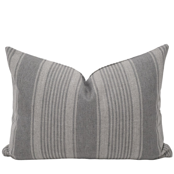 Blue Heron Stripe Lumbar Pillow Cover featuring woven blue-gray stripes on a natural linen-look fabric with classic grain sack inspired styling for coastal and luxury interiors.