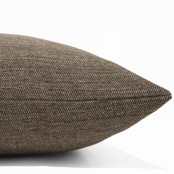Brown Jumper pillow cover in rich brown herringbone indoor performance upholstery fabric, handmade by Hackner Home for organic modern and rustic luxury interiors. Side view of cushion cover.