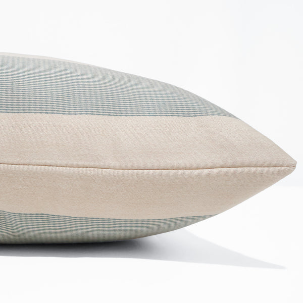 Cape Stripe Seafoam indoor outdoor pillow cover handcrafted from genuine Sunbrella performance fabric featuring wide ivory and seafoam blue-green stripes, luxury coastal decorative throw pillow for patios, porches, beach homes, and designer interiors. Side View of cushion cover.