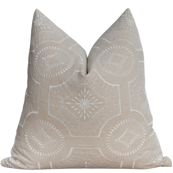 Decorative pillow with geometric pattern on a white background