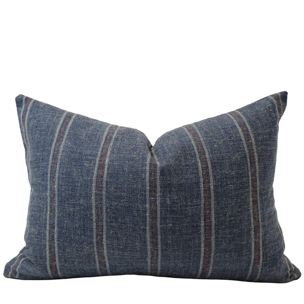 Foundry Stripe decorative lumbar cushion cover handcrafted from a premium polyester, acrylic, and linen blend upholstery fabric featuring deep indigo blue with ivory and muted brick pinstripes, luxury designer accent pillow for transitional, traditional, modern farmhouse, and contemporary interiors.