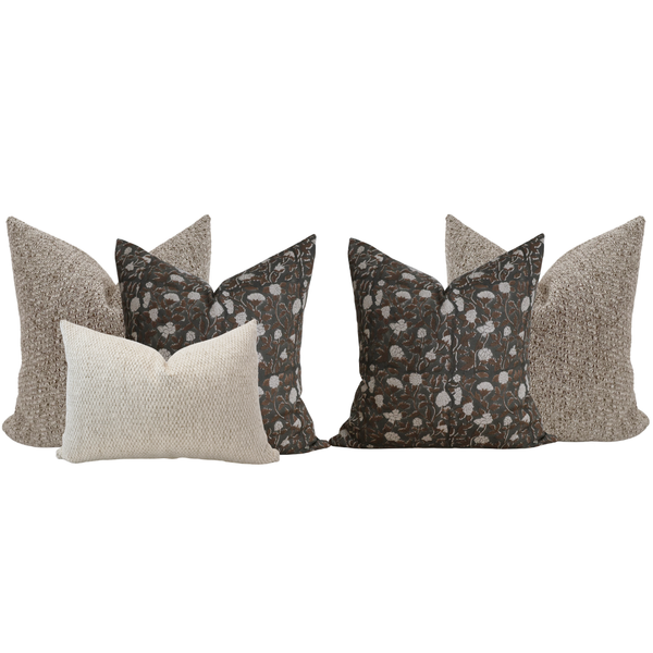 Set of decorative pillows with various patterns on a white background