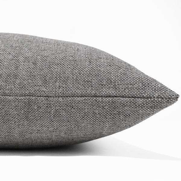 Granite Weave Indoor/Outdoor Pillow Cover crafted from woven performance fabric with a richly textured stone-inspired weave for coastal, modern organic, and luxury interiors. Side view of Cushion Cover