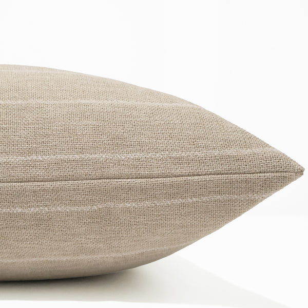 Heritage Stripe Ivory decorative pillow cover in premium woven performance fabric with subtle ivory pinstripes, luxury handmade neutral throw pillow cover by Hackner Home for coastal, organic modern, farmhouse, transitional, and traditional home décor. Side view of cushion cover.