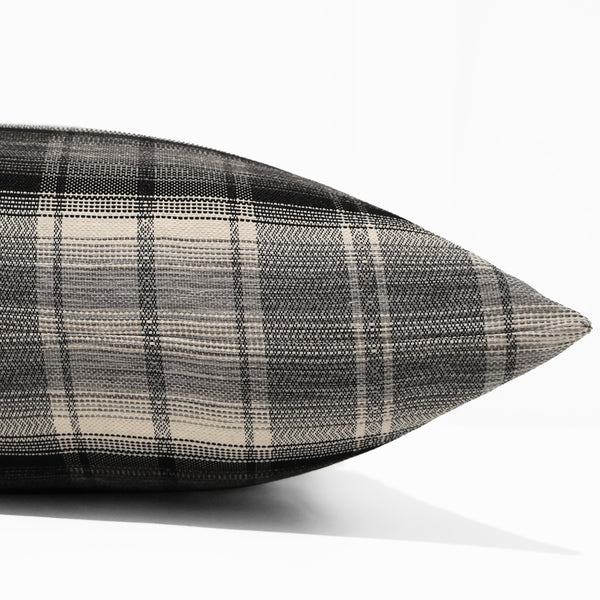 Highland Plaid Pillow Cover in black, ivory, charcoal, and gray performance upholstery fabric, handmade by Hackner Home for traditional and modern farmhouse interiors. Side view of cushion cover.