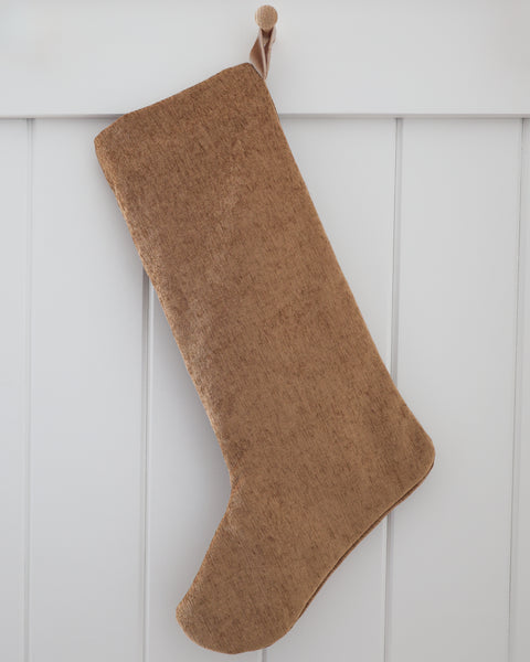 Praline Textured Large Minimal Christmas Stocking hanging from a wooden peg.