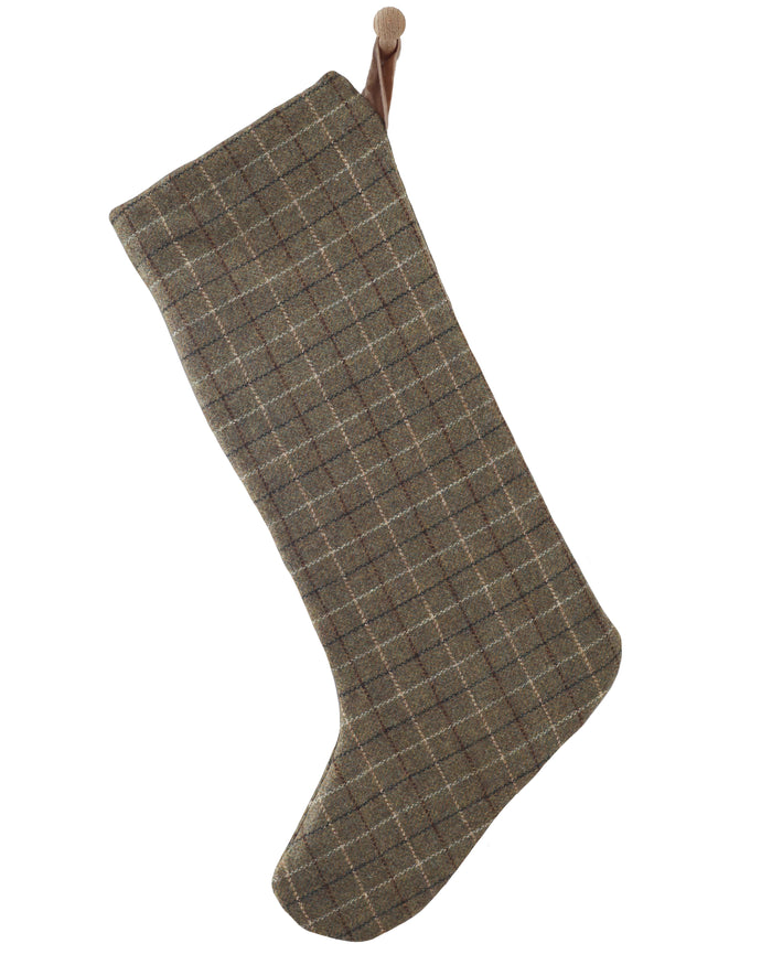 Large Design plaid wool Christmas stocking with a long leg in deep green with a sand velvet hanging loop, shown on a white background