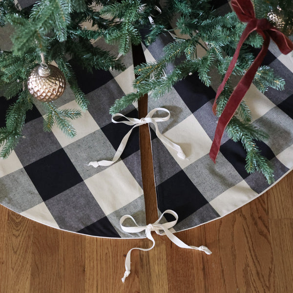 Handmade black and warm white buffalo plaid Christmas tree skirt in 100% cotton by HACKNER HOME