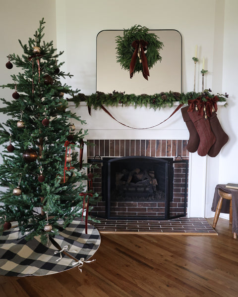 Handmade black and warm white buffalo plaid Christmas tree skirt in 100% cotton by HACKNER HOME