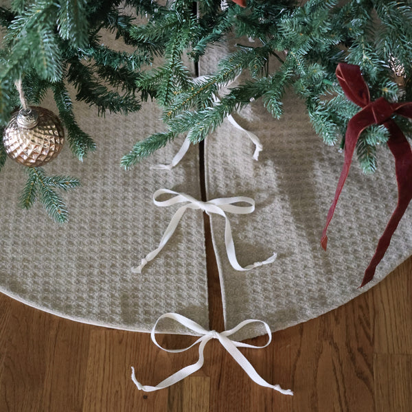 Textured natural linen and cotton blend fabric detail on handmade Christmas tree skirt