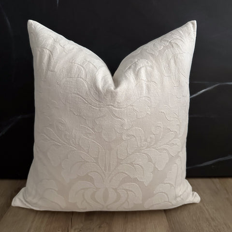 white color and subtle damask pattern make this pillow cover a versatile choice for any interior style