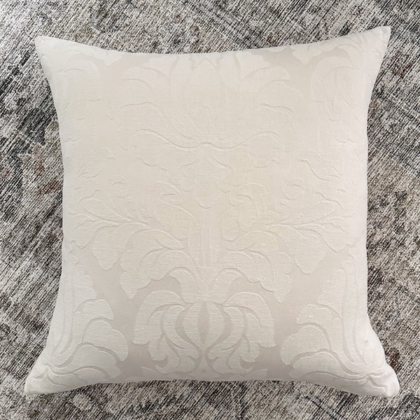 white color and subtle damask pattern make this pillow cover a versatile choice for any interior style