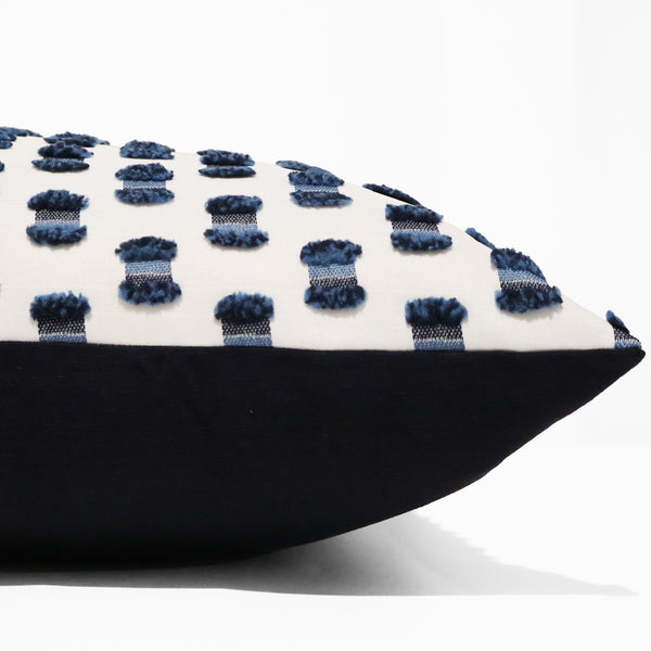 Ivory Interlace Pillow Cover in ivory upholstery fabric with raised navy woven accents, handmade by Hackner Home for coastal and transitional interiors. Side view of cushion Cover