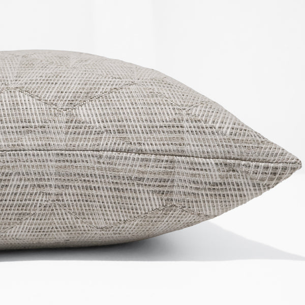 Ivory Mosaic Indoor/Outdoor Pillow Cover featuring a woven ivory, stone, and greige mosaic-inspired pattern on performance fabric for coastal, luxury, and modern organic interiors. Side view of Throw Pillow
