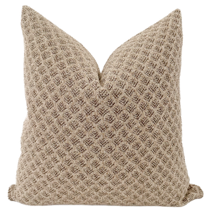 Whether placed on a sofa, chair, or bed, the Lolo Rossa pillow cover becomes a focal point, seamlessly blending with various color schemes and decor styles. Its light brown tone provides a neutral backdrop, allowing for easy integration into existing design elements.