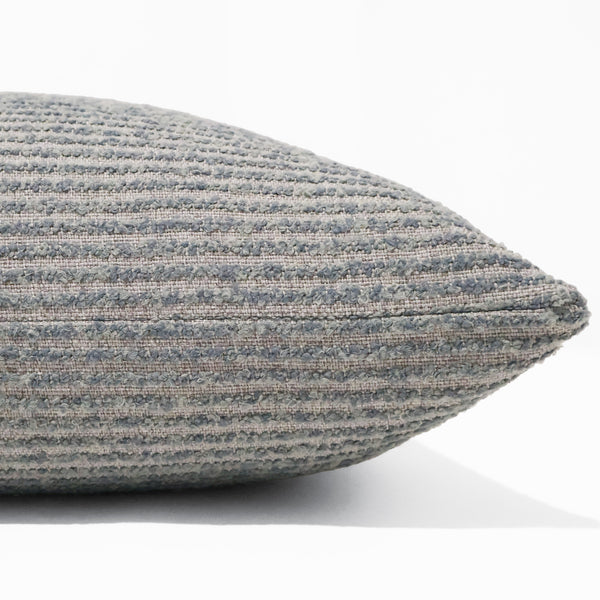 Misty Harbor Bouclé Pillow Cover in soft blue-gray textured bouclé fabric with ribbed woven design, luxury decorative throw pillow for coastal and modern interiors. Side View.