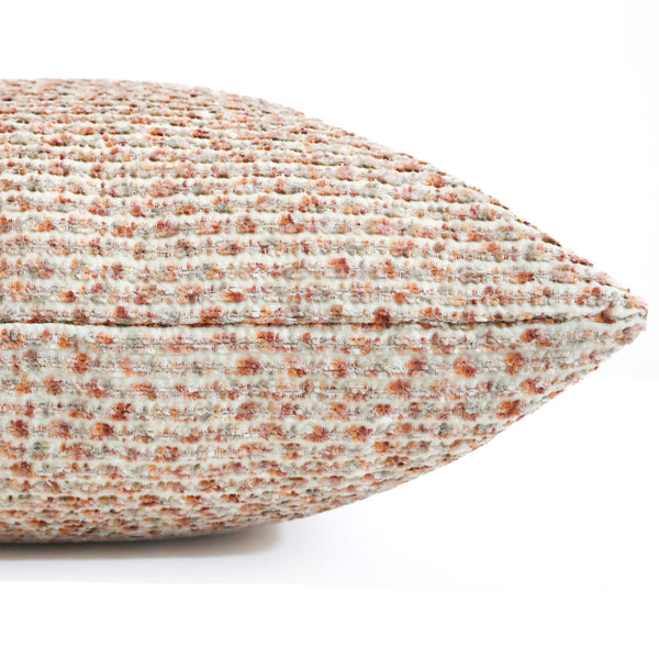Plush Pebble decorative pillow cover featuring a soft textured woven fabric in blush, ivory, and oatmeal tones with a boucle-inspired finish, handcrafted luxury accent pillow for modern, coastal, transitional, and contemporary interiors. Side view of cushion cover.