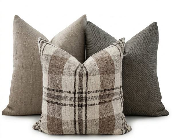 Quiet Retreat Pillow Cover Set featuring Belgian linen windowpane, woven gray, and classic plaid pillow covers in taupe, gray, and cream, handmade by Hackner Home.