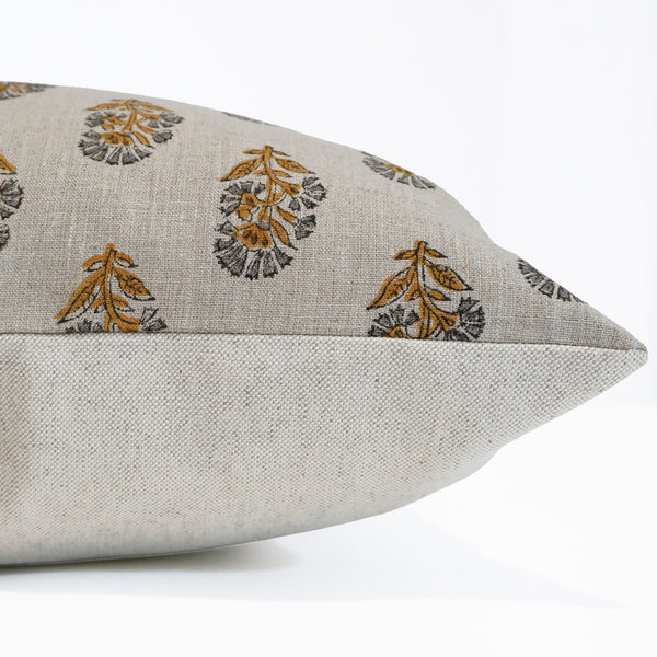 Saffron Garden Block Print Pillow Cover featuring hand block printed saffron gold and charcoal floral motifs on natural 100% linen, handmade by Hackner Home. Side view of Cushion Cover