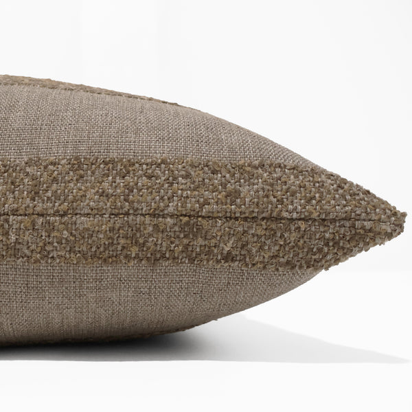 Sandbar Stripe Indoor/Outdoor Pillow Cover featuring woven sand and taupe textured stripes on performance fabric for coastal, modern organic, and luxury interiors. Side view of cushion cover.