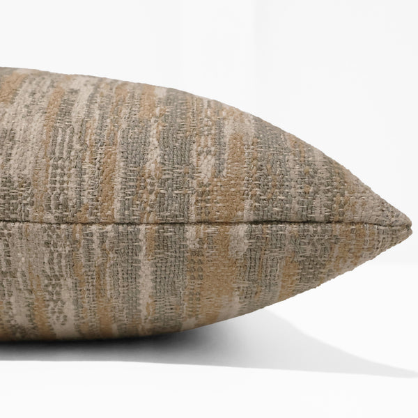 Sedona Weave decorative pillow cover in textured woven upholstery fabric with warm ivory, sand, taupe, and gray tones, luxury handmade throw pillow cover by Hackner Home for coastal, organic modern, rustic, and transitional home décor. Side view of woven cushion cover.
