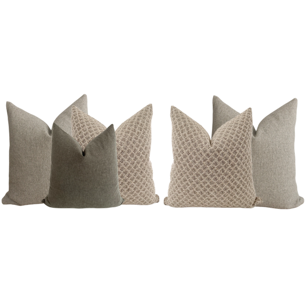 Set of six textured pillows on a white background