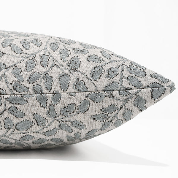 Willow Vine Sky Pillow Cover featuring a woven sky blue botanical vine pattern on ivory stain-resistant performance fabric for coastal, luxury, and transitional interiors. Side View of Cushion Cover