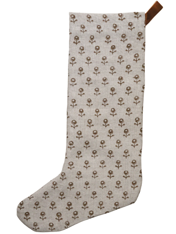 Large linen Christmas stocking with a minimalist brown floral block print pattern and a brown velvet hanging loop, displayed on a plain background.
