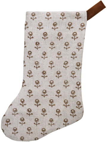 Neutral linen Christmas stocking with a tan floral block print pattern and a brown velvet hanging loop, displayed on a white background.
