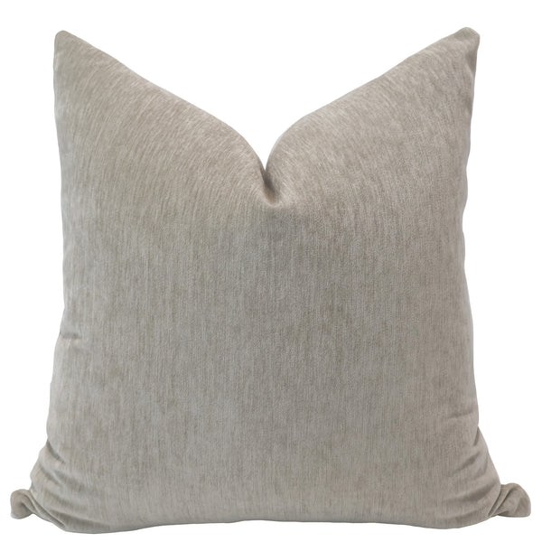 Square pillow in a soft ash gray velvet fabric with a subtle sheen and smooth, luxurious texture.