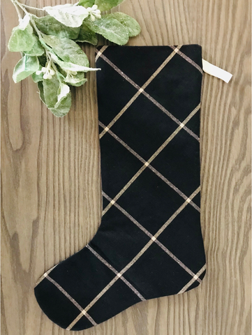 Black diamond plaid Christmas stocking with beige grid pattern, handmade holiday décor by Hackner Home.