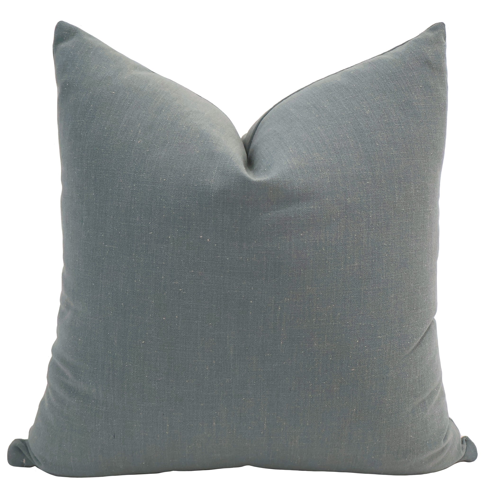 Hackner Home Blue Drift pillow cover made from soft textured linen in a muted blue shade, styled with a simple knife-edge design for a modern coastal look.