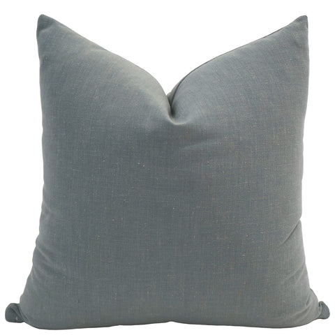 Hackner Home Blue Drift pillow cover made from soft textured linen in a muted blue shade, styled with a simple knife-edge design for a modern coastal look.
