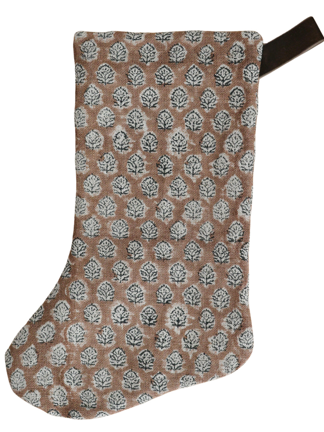 Brick rose block print Christmas stocking featuring a repeating hand-stamped floral motif in white and charcoal with a dark velvet hanging loop.