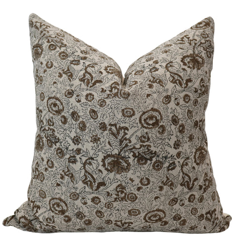 Square pillow cover featuring a detailed chocolate brown floral block print on a beige background.