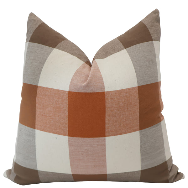 Hackner Home Cider Plaid pillow cover featuring a large-scale check pattern in warm rust, tan, and cream tones for a cozy, modern farmhouse look.