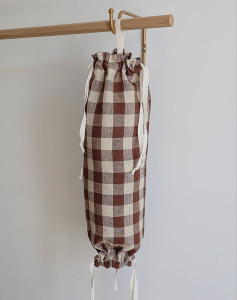 Hackner Home brown gingham fabric grocery bag holder with drawstring ties.