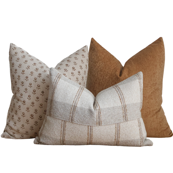 Hackner Home Cottage Ember pillow cover set featuring warm neutral tones with floral, stripe, and textured designs for a cozy cottage look.
