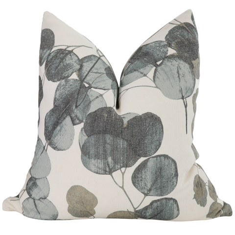 Hackner Home Eucalyptus Leaf pillow cover featuring soft sage, olive, and charcoal botanical print on a neutral cream background.