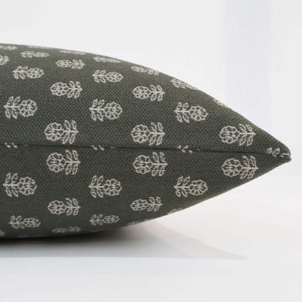 Hackner Home dark green decorative pillow cover with white hand-block floral design, perfect for cozy modern or cottage-style decor.