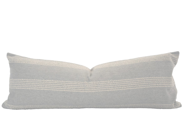 Hackner Home French Grain Sack Blue lumbar pillow cover with horizontal cream textured stripes on soft light blue fabric, perfect for farmhouse or coastal decor.