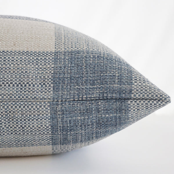 Side view of Hackner Home Hampton Breeze plaid pillow cover showing blue and ivory woven texture and hidden zipper detail.