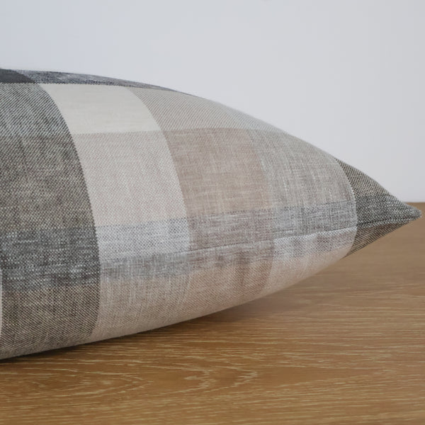 Side view of Hackner Home Ironwood plaid pillow cover in neutral beige and gray tones, showcasing the soft linen texture and tailored seams.